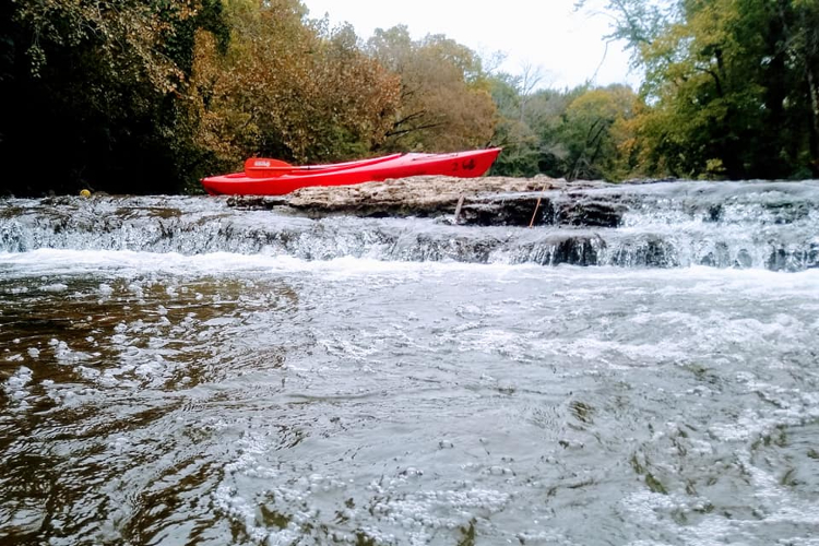 red kayak in the water